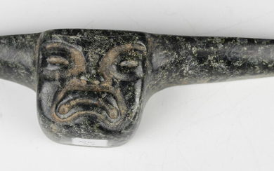 A pre-Columbian Olmec style carved green hardstone spoon, probably 900-450 BC, one side carved with
