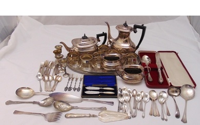 A quantity of silver plate to include a teaset, an oval tray...