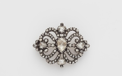 A silver 14k gold and foiled rose-cut diamond brooch.