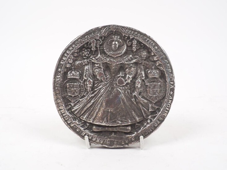 A silver mounted replica of the 'Great Seal' of Queen Elizabeth I, London, c.1979, BJS, with felt covered wooden back, 14cm dia.