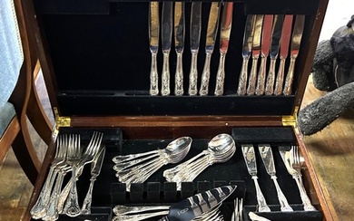 A silver plated King's pattern canteen of cutlery, in a maho...