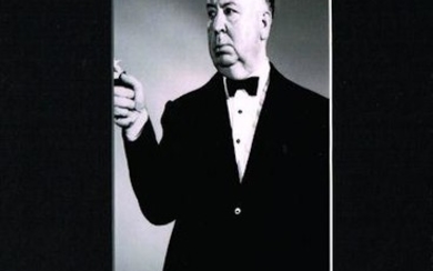 ALFRED HITCHCOCK. (1899-1980). An autographed piece of paper by...