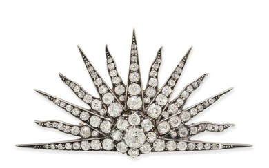 AN ANTIQUE DIAMOND SUNBURST BROOCH in yellow gold and silver, designed as a thirteen rayed rising