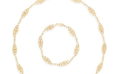 AN EARLY 20TH CENTURY GOLD NECKLACE WITH MATCHING BRACELET, CIRCA...
