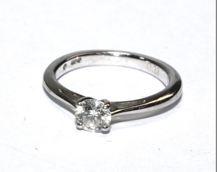 An 18 carat white gold ring with single stone diamond 0.28 c...
