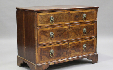 An 18th century oak and walnut chest of three drawers with crossbanded borders, on bracket feet, hei