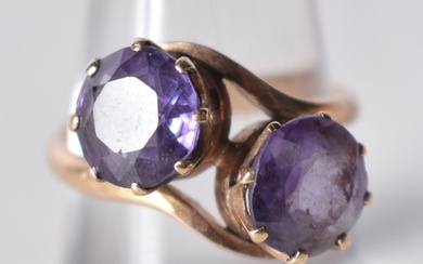An Antique Gold Crossover Ring set with Two Amethyst. Size ...
