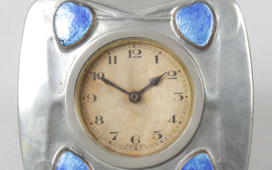 An Archibald Knox for Liberty & Co. London English pewter easel style desk clock.