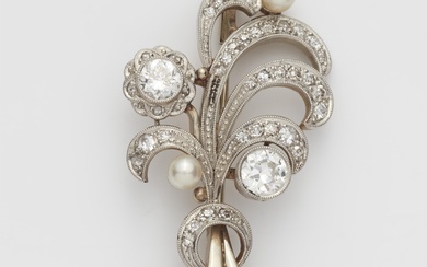 An Art Déco 14k gold platinum diamond and pearl spray brooch.