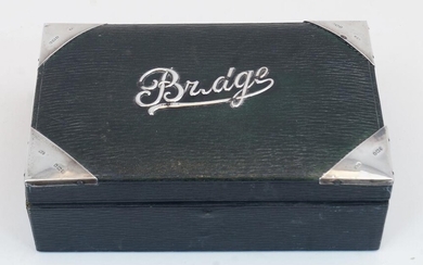 An Edwardian silver mounted green leather Bridge box, Birmingham, 1908, Charles Penny Brown, of rectangular form with applied silver corners and Bridge detail to hinged lid, 11.5 x 18.2 x 6cm