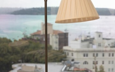 An antique brass standing lamp with cream shade, Height 110...