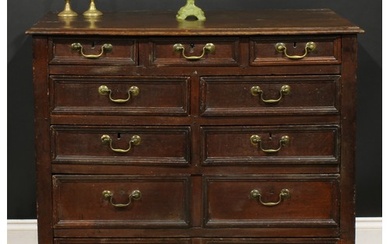 An early 18th century oak chest, rectangular top with moulde...