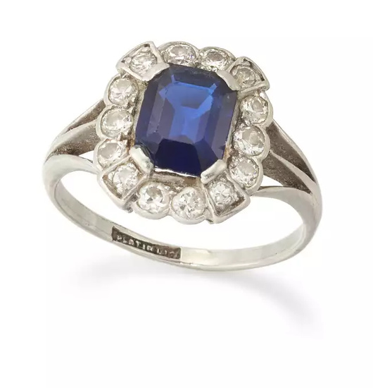 An early 20th century platinum, sapphire and diamond cluster ring,...