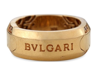 An eighteen karat gold and diamond band, Bulgari designed...