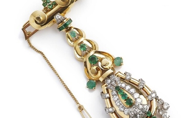 SOLD. An emerald and diamond brooch with a watch set with numerous circular and square-cut emeralds and single and old-cut diamonds, mounted in 18k gold platinum. – Bruun Rasmussen Auctioneers of Fine Art