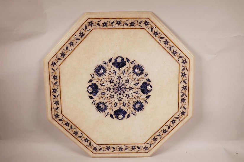 An octagonal Indian inlaid pietra dura marble table top, 21"...