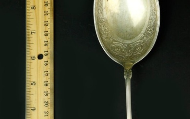 Antique sterling silver serving spoon, marked