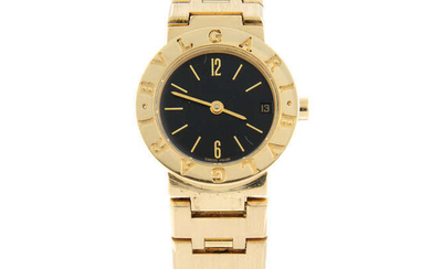 BULGARI - an 18ct yellow gold Bulgari bracelet watch, 23mm.