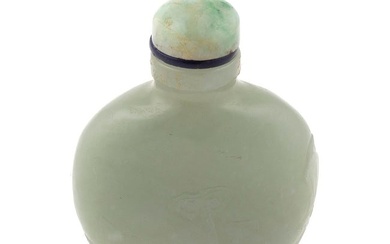 CHINESE CARVED CELADON JADE SNUFF BOTTLE Late 19th Century Height 2.5". Celadon jade stopper.