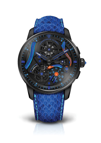 CHRISTOPHE CLARET MAESTRO CORAIL At the heart of the Maestro Corail is placed a coral snake. Wrapped around the movement, its undulating hand-engraved body creates a powerful contrast between the tangy blue and orange brilliancy of its scales and the...
