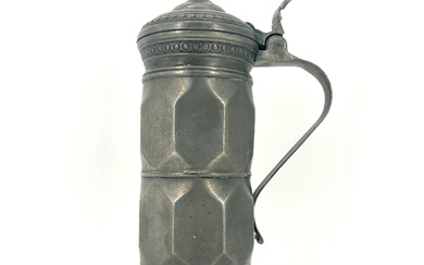 CULTURAL PROPERTY IN TIN: LARGE ROLLING JUG TANKARD FROM THE 19TH CENTURY.