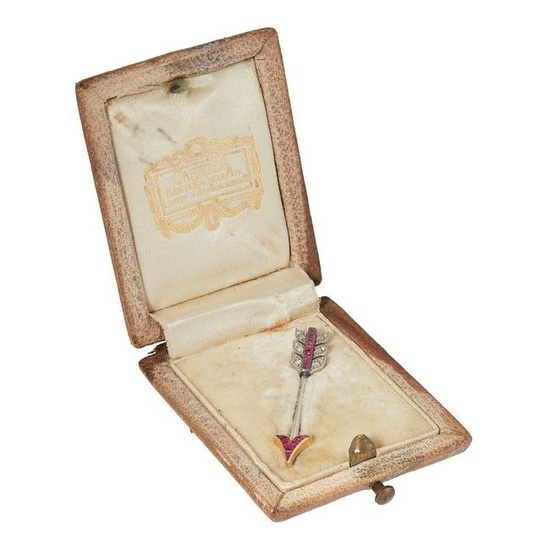 Cartier: An early 20th century ruby and diamond arrow brooch, circa 1920