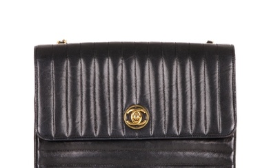 Chanel, a vintage quilted Single Flap handbag, featuring a v...