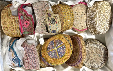 Collection of embroidered hats from Kutch, Gujarat, and Afghanistan