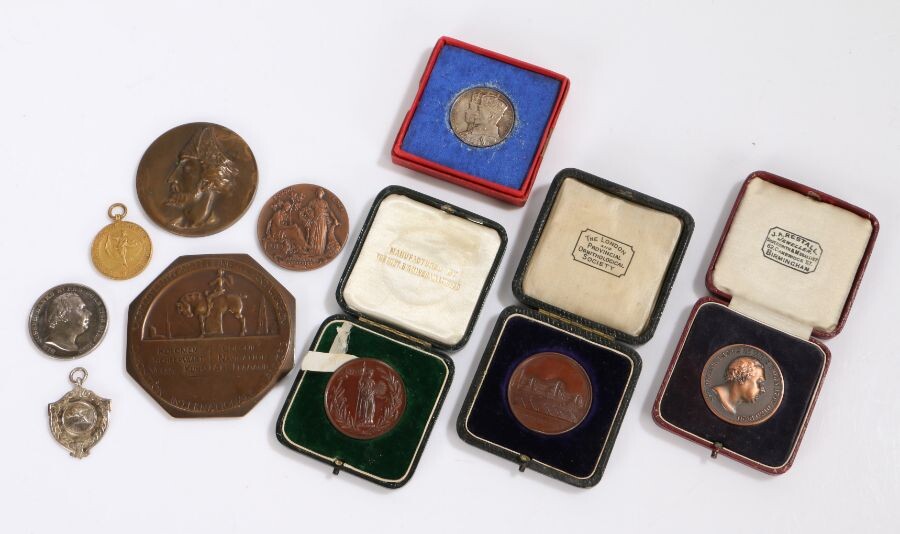 Collection of medallions, to include the Hovis Bread medallion, struck in bronze and awarded to A.