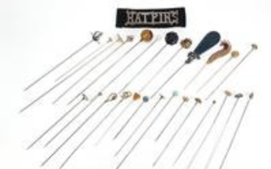 Collection of vintage hat pins including one unmarked