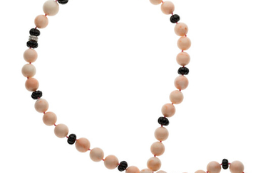 Coral, Diamond, Black Onyx, White Gold Necklace The necklace...
