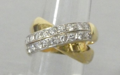 Double ring in yellow gold, one paved with...