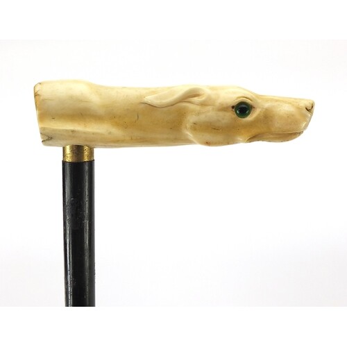 Ebony walking stick with carved ivory pommel in the form of ...