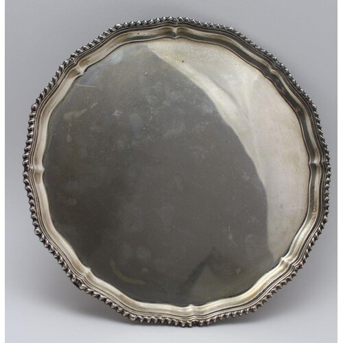F.C. Richards, a silver salver of Georgian style, gadrooned ...