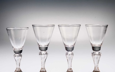 FOUR 18TH CENTURY MOULDED-STEM WINE GLASSES