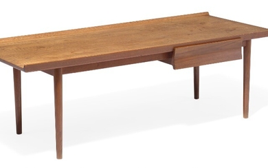 Finn Juhl: A teak table/bench with round, tapering legs. Rectangular top with raised sides, right side mounted with drawer with concave front.