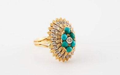 Flower ring in gold 750 °/°°° decorated with turquoise cabochons...