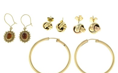 Four pairs of earrings.