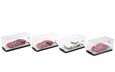 Four white metal 1:43 scale model cars