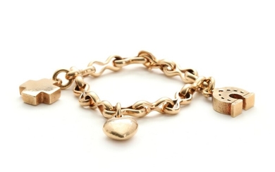 Frits Heiring Sørensen: A 14k gold charm bracelet. Weight app. 65.5 gr. L. 19 cm.