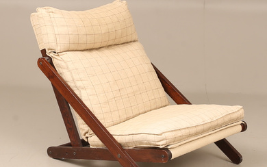 GILLIS LUNDGREN. An “Idre” stained pine armchair, second half of the 20th century.
