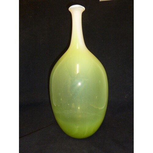 Joseph Hodspodka - an ovoid glass bottle vase, in white grad...
