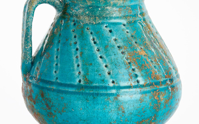 KANNA, Persia, Safavid (1501—1736) or earlier, likely Keshan, earthenware with glaze in turquoise and iridescent patina.