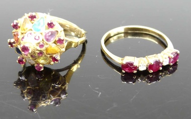 Lot details An 18ct gold, ruby and cz set half...