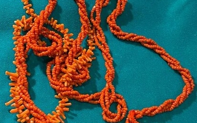 Lot including a long necklace of braided coral and a...