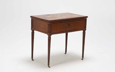 Louis XVI mahogany table with hinged top, in which mirror. Channeled legs on wheels. 18th century