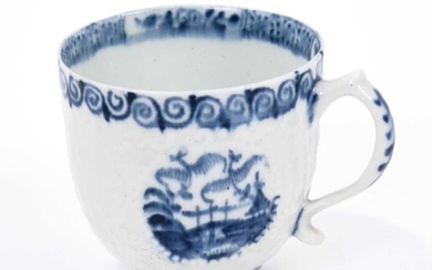 Lowestoft coffee cup, with a scrolled handle, moulded in relief in Hughes style with flowers, diaper panels and three circular panels painted in blue with different Chinese scenes, scrolled border...