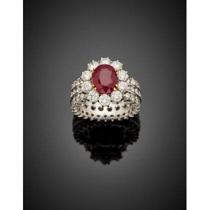 Oval ct. 2.80 circa ruby and diamond white gold cluster ring, diamonds in all ct. 4.20 circa, g 12.98 circa…Read more