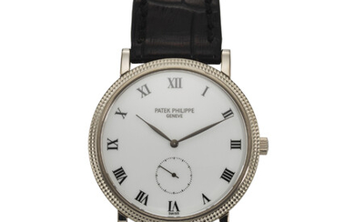 PATEK PHILIPPE, REF. 3919, CALATRAVA, A FINE 18K WHITE GOLD WRISTWATCH WITH SUBSIDIARY SECONDS AND PORCELAIN DIAL