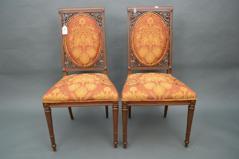 Pair of French Empire style side chairs. The open